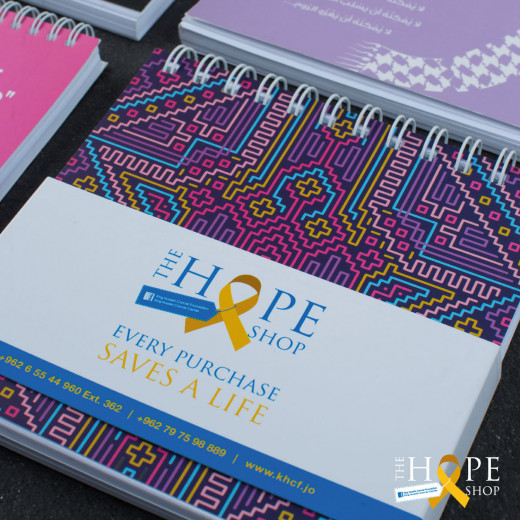 دفتر من متجر الأمل برعاية مؤسسة الحسين للسرطان